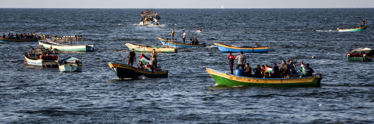 Palestinians protest in boats off Gaza coast.