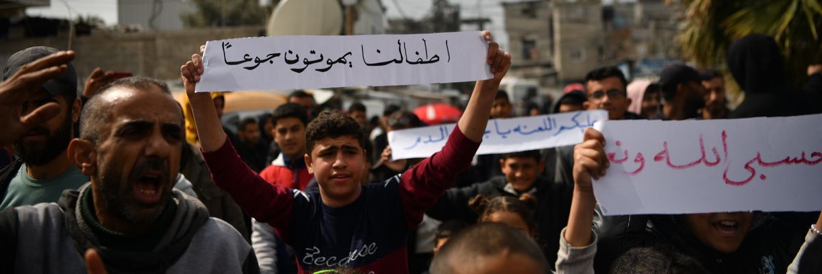 Palestinians protest in Rafah