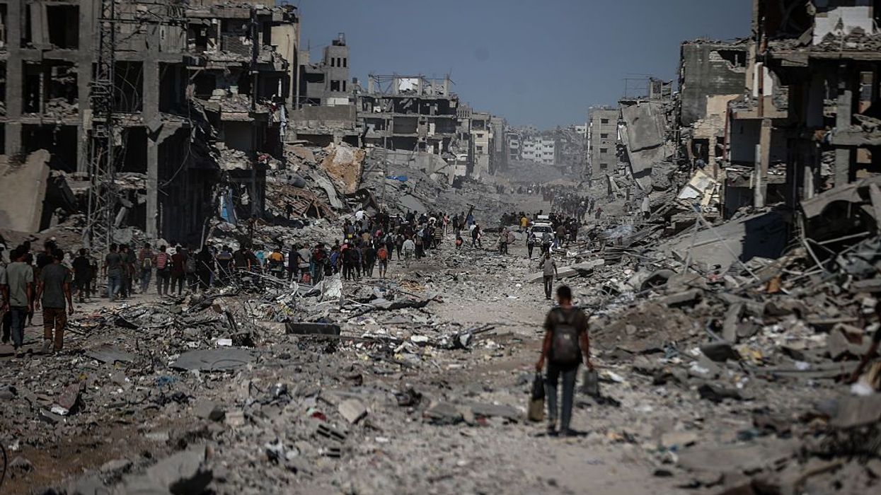 Palestinians return to their homes in Gaza as ceasefire takes effect