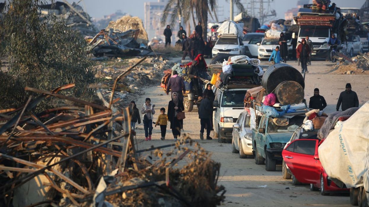 Palestinians returning to their homes in Gaza after cease-fire agreement