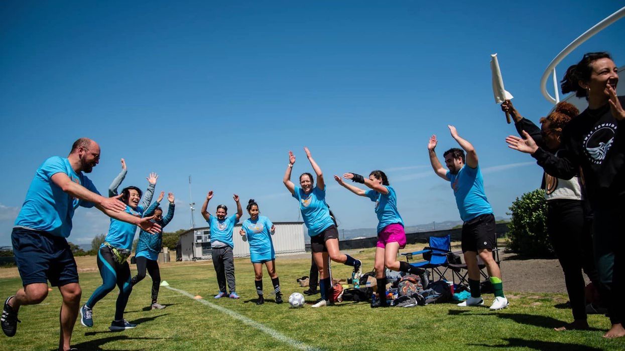 Pangea Legal Services staff members participate in game.