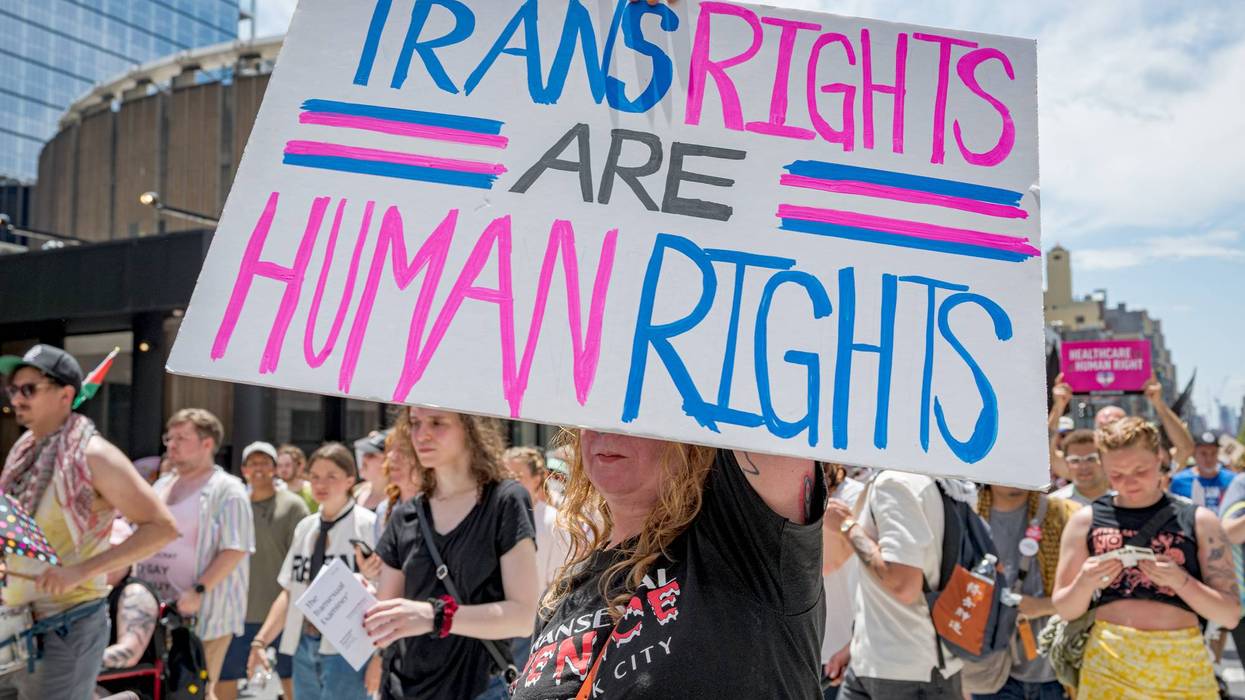 Participant seen holding a sign at the march. Thousands of