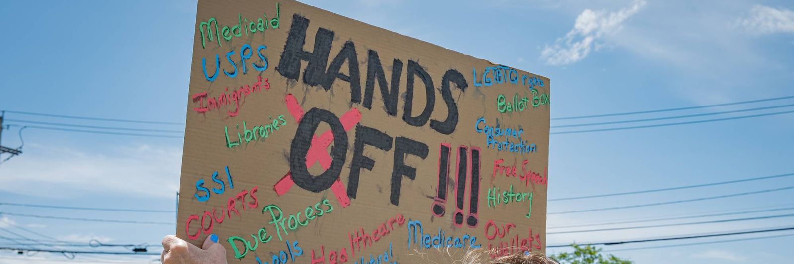 participant-seen-holding-a-sign-at-the-p