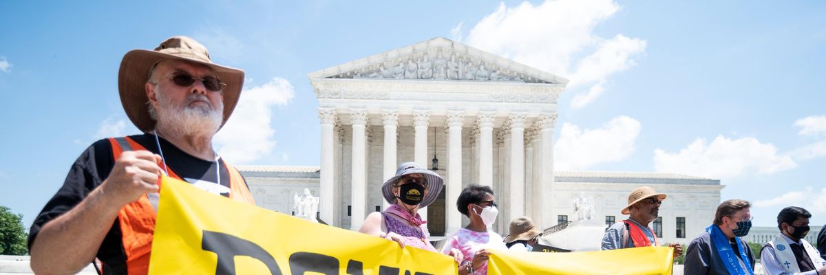 Participants hold "Don't Filibuster" banners during the Poor People's Campaign news conference in front of the U.S. Supreme Court on July 12, 2021, to announce a season of nonviolent direct action. (Photo: Bill Clark/CQ-Roll Call, Inc via Getty Images)