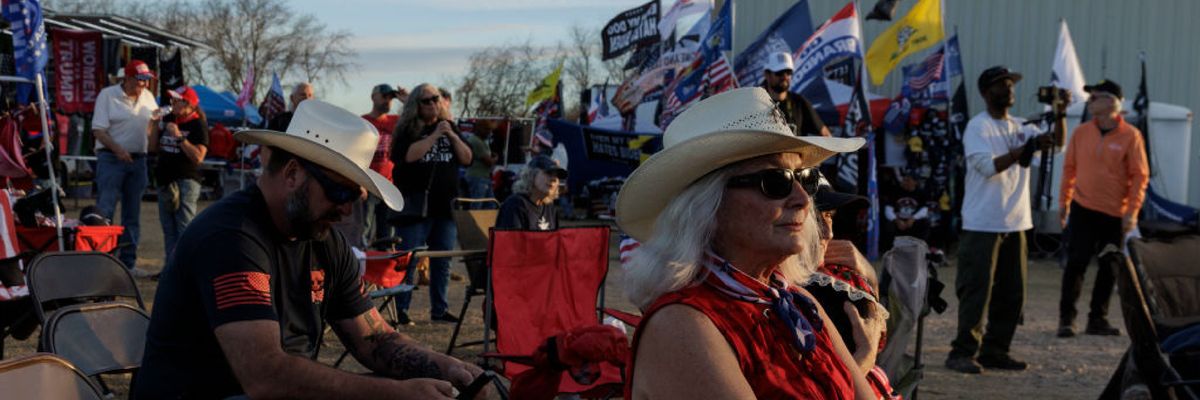 Participants of Take Our Border Back Convoy listen to worship service