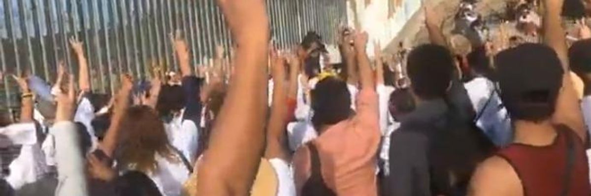 'Our Voices Together Will Transcend Barriers': At 'Powerful' US-Mexico Border Choral Event, Participants Sing The Beatles