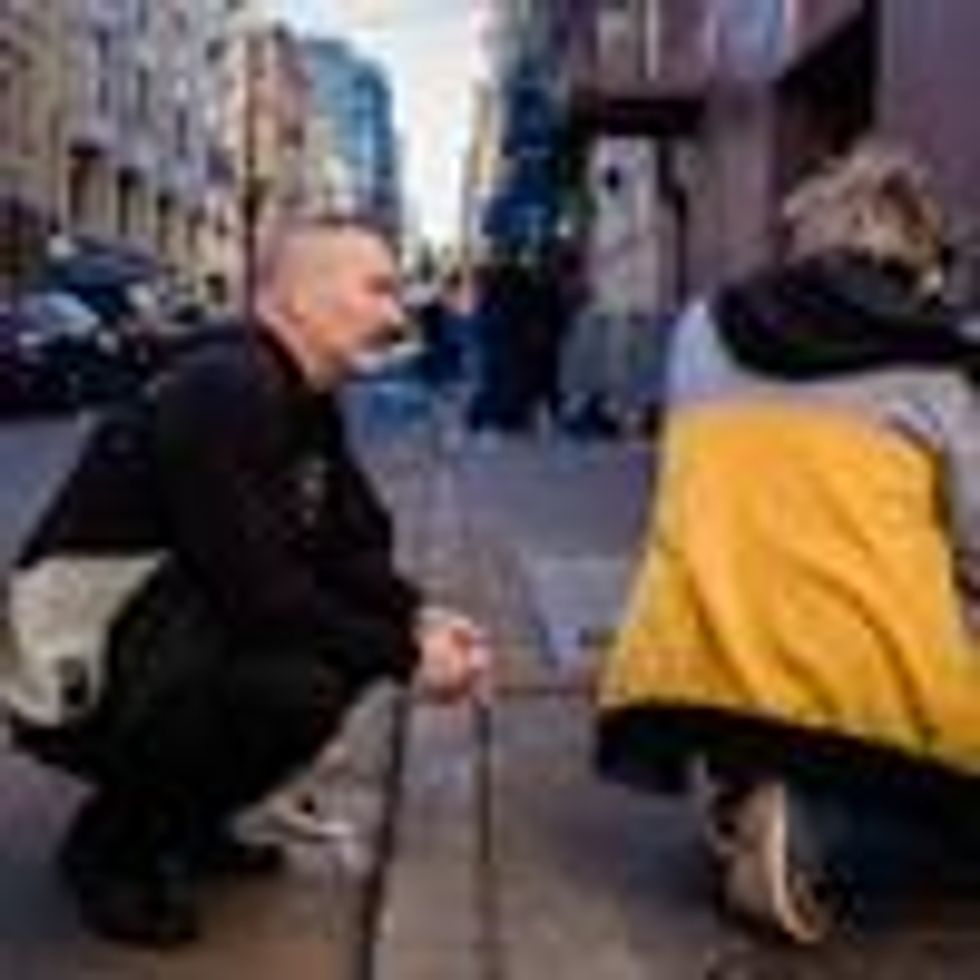 Paul Harkin, director of harm reduction at GLIDE, speaks with a person on an alleyway that is popular with people who use drugs on February 3, 2020. Harkin provides narcan, fentanyl detection packets, and tinfoil to people struggling with addiction as a part of outreach on the streets of San Francisco. (Photo: Nick Otto/Washington Post via Getty Images)