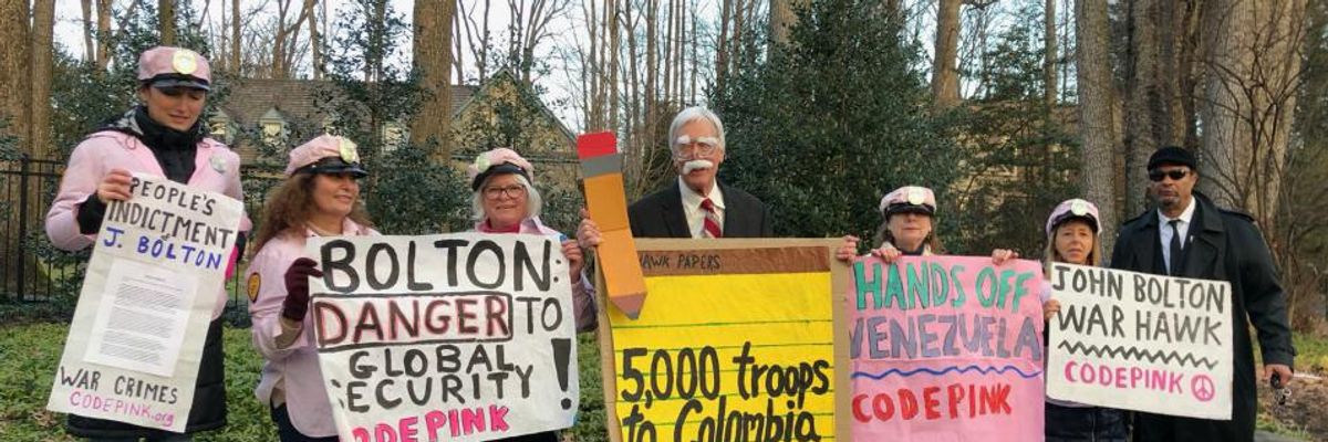 'Take John Bolton to The Hague!': Peace Activists Protest Outside National Security Advisor's Home