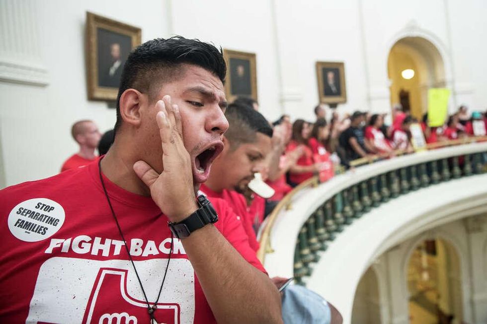 Pedro Paredes joins hundreds at the Texas Capitol to protest Senate Bill 4. Photo: Ricardo Brazziell, MBO / Austin American-Statesman