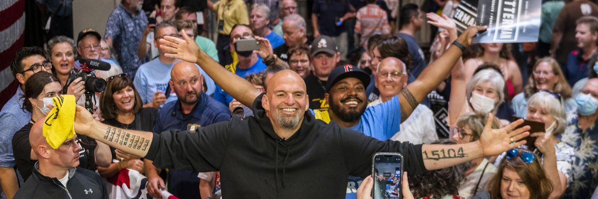 Pennsylvania Lt. Gov. John Fetterman, the Democratic nominee for the state's open U.S. Senate seat, takes photos with supporters following a rally at the Bayfront Convention Center on August 12, 2022 in Erie.