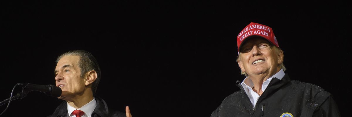 Pennsylvania Republican U.S. Senate candidate Dr. Mehmet Oz joins former President Donald Trump on stage during a campaign at the Westmoreland County Fairgrounds on May 6, 2022 in Greensburg, Pennsylvania.