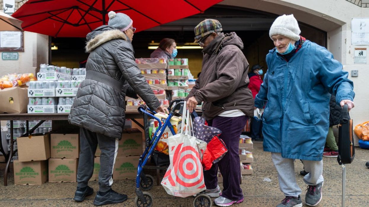 People accept free food at food bank in Brooklyn