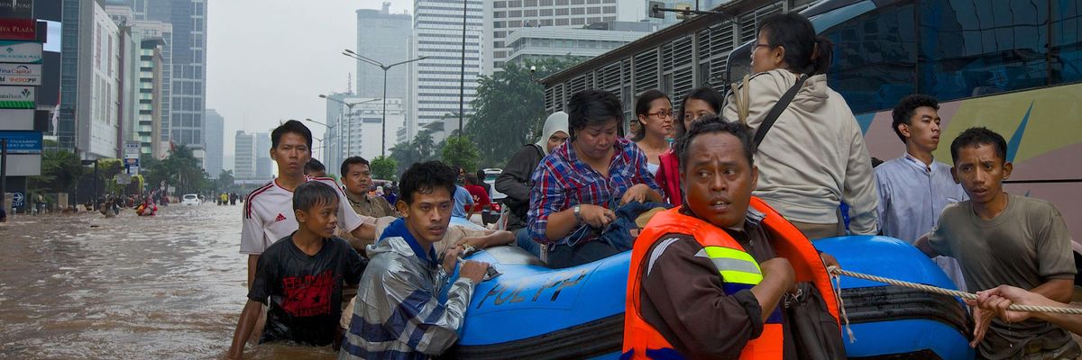  People are stranded by floodwaters in Jakarta's central business district on January 17, 2013 in Jakarta, Indonesia. 