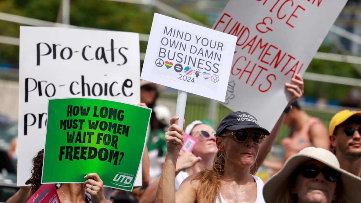 People attend the Our Bodies Our Lives: A Rally for Reproductive Freedom