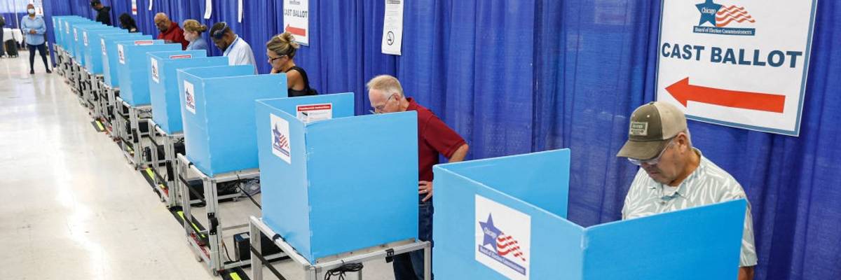 People cast ballots in a Chicago polling station