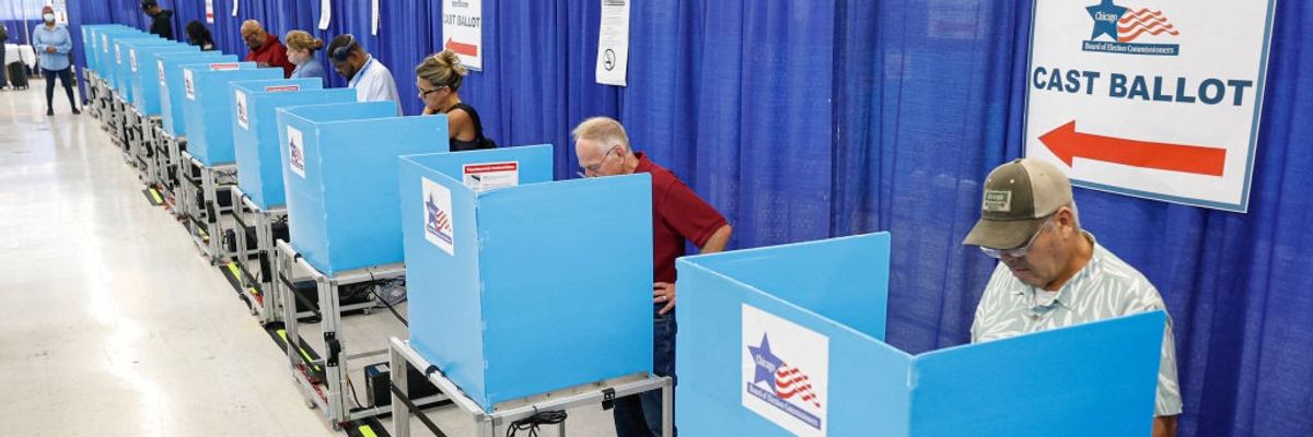 People cast ballots in a Chicago polling station
