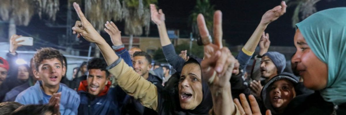 People celebrate a cease-fire deal