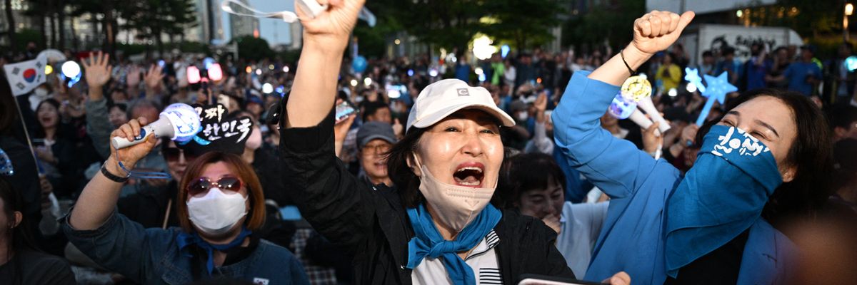 People celebrate likely win of Lee Jae-Myung in South Korea.