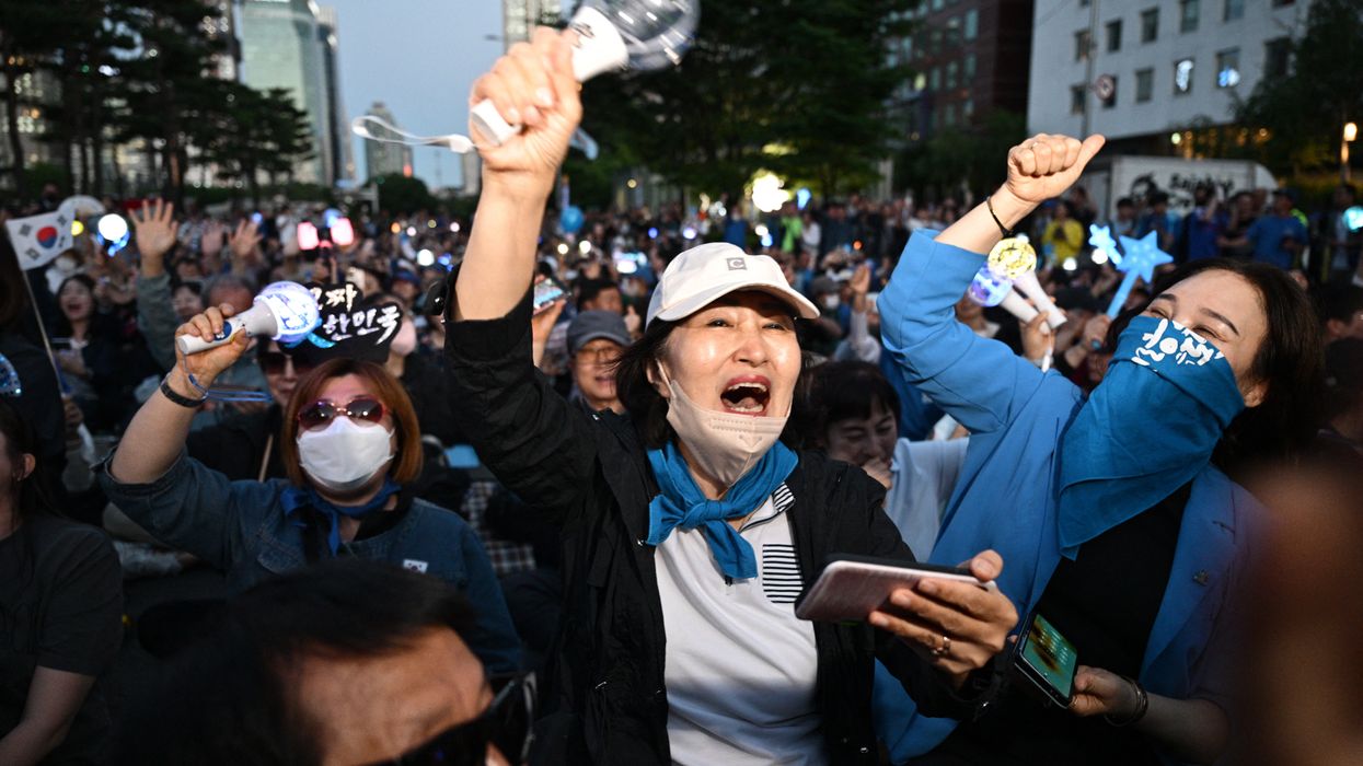 People celebrate likely win of Lee Jae-Myung in South Korea.
