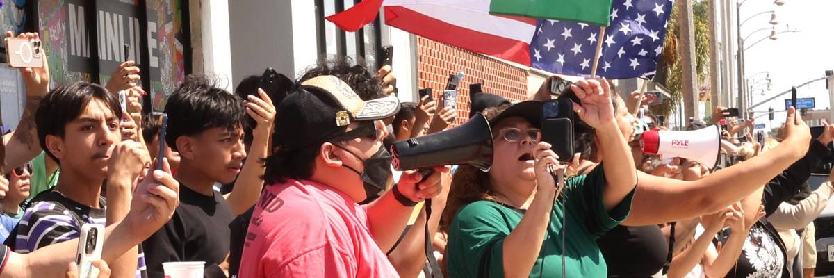 People film border patrol agents after a raid.
