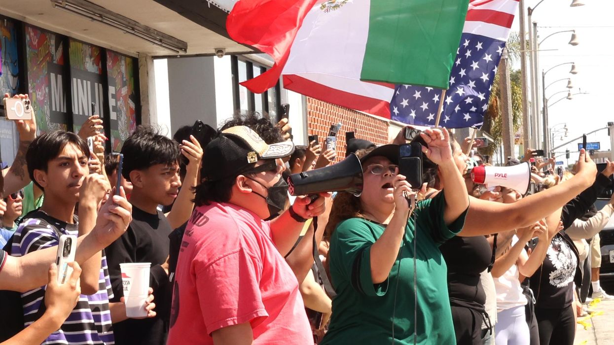 People film border patrol agents after a raid.
