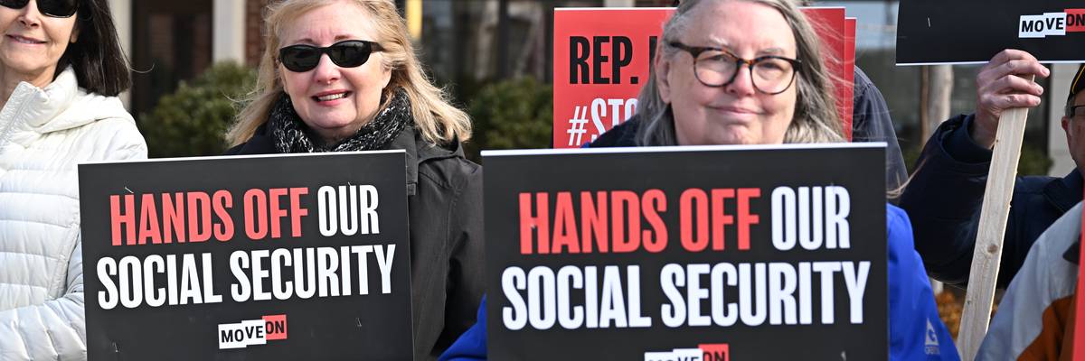 People gather at a rally supporting Social Security.