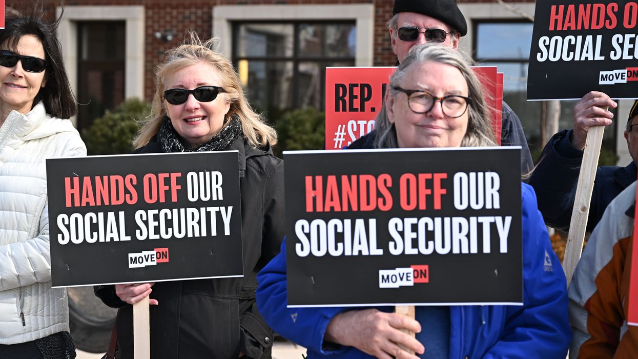 People gather at a rally supporting Social Security.