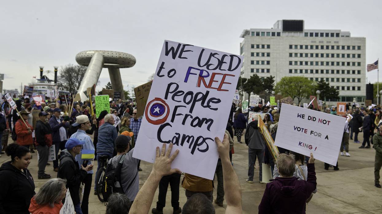 People gather at Hart Plaza in downtown Detroit, Michigan on April 19, 2025, to protest the Trump administration