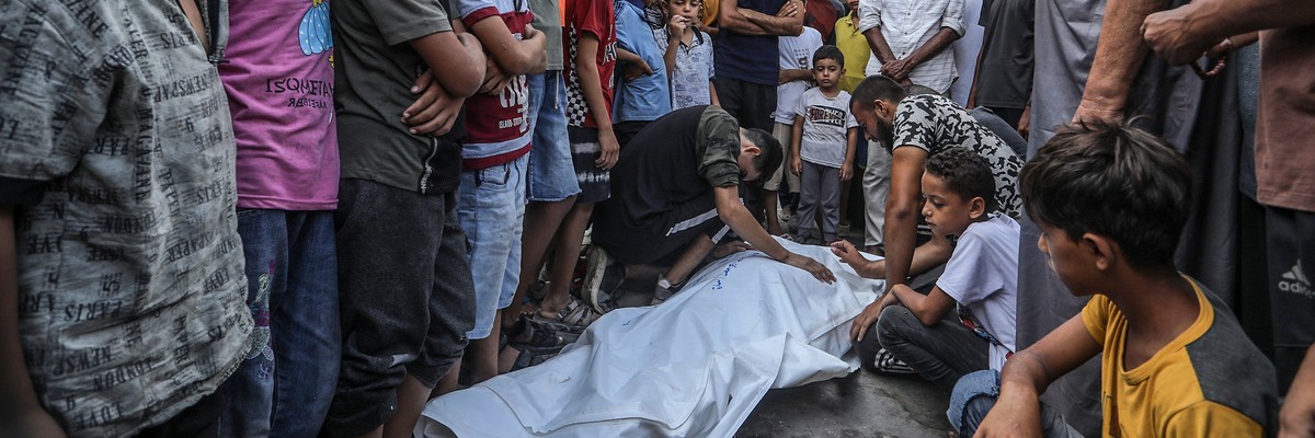 People gather for a funeral ceremony in Gaza