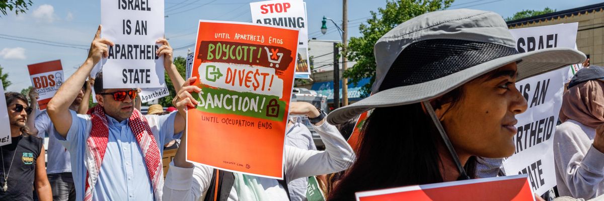 People gather in Columbus, Ohio on June 12, 2021, to protest the Israeli occupation of Palestine and call for boycotting companies that support Israel's apartheid regime.