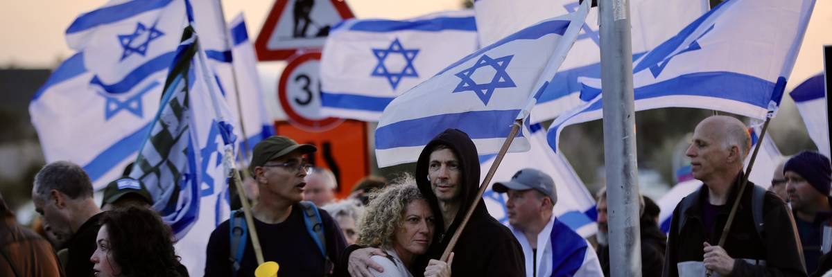 People gather in front of Israel's parliament in Jerusalem on February 20, 2023 to protest a proposed overhaul of the judicial system.