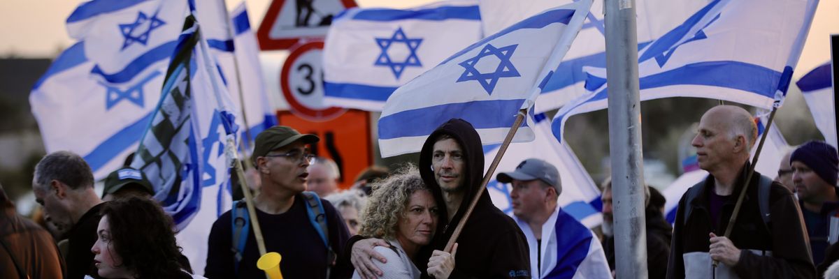 People gather in front of Israel's parliament in Jerusalem on February 20, 2023 to protest a proposed overhaul of the judicial system.