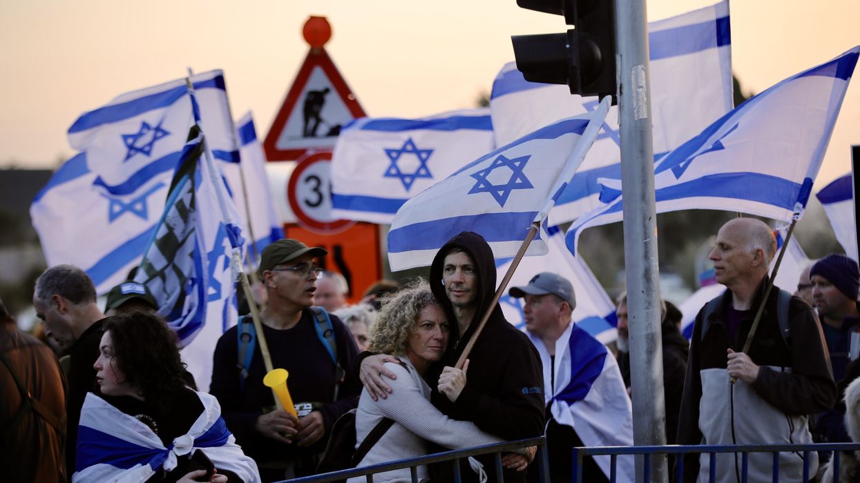 People gather in front of Israel's parliament in Jerusalem on February 20, 2023 to protest a proposed overhaul of the judicial system.