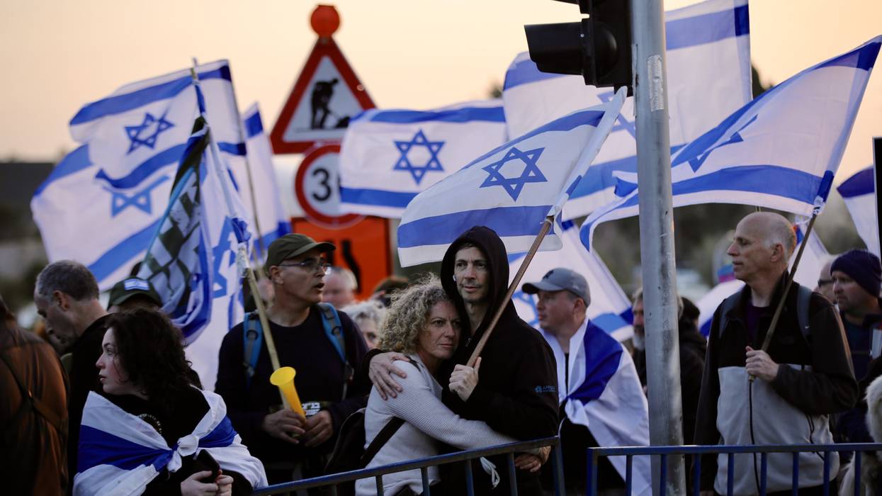 People gather in front of Israel's parliament in Jerusalem on February 20, 2023 to protest a proposed overhaul of the judicial system.