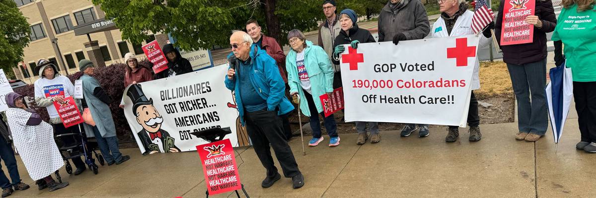 People gather in Westminster, Colorado to protest healthcare cuts on May 5, 2026.