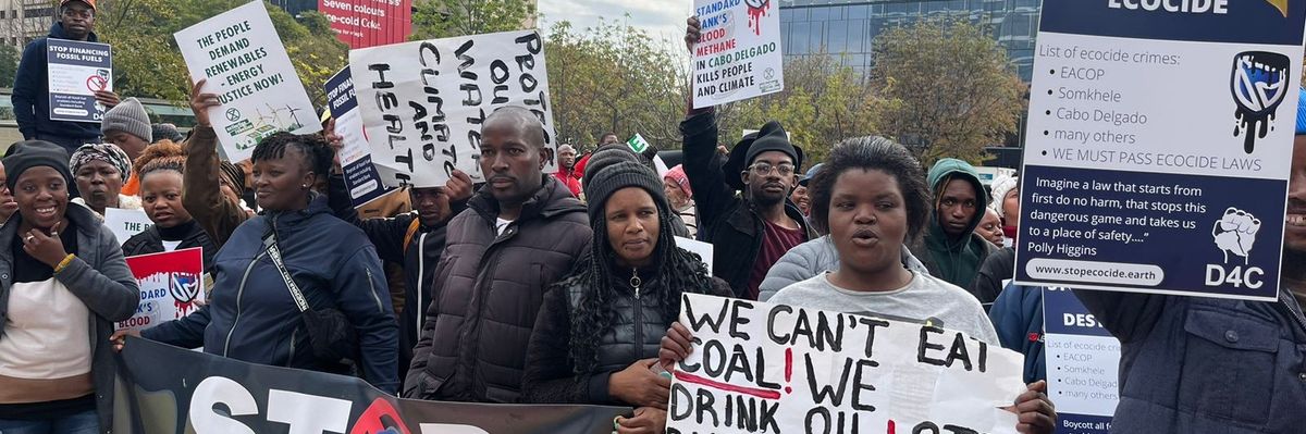 ​People gather outside Standard Bank's offices in Johannesburg, South Africa on June 12, 2023.