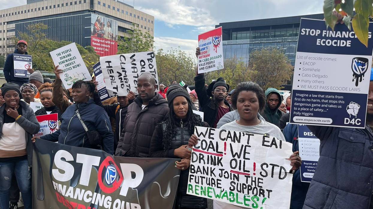People gather outside Standard Bank's offices in Johannesburg, South Africa on June 12, 2023.