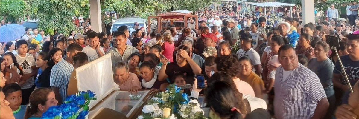 People gathered on January 8, 2023 to honor environmental defenders killed in Guapinol, Honduras the previous day.