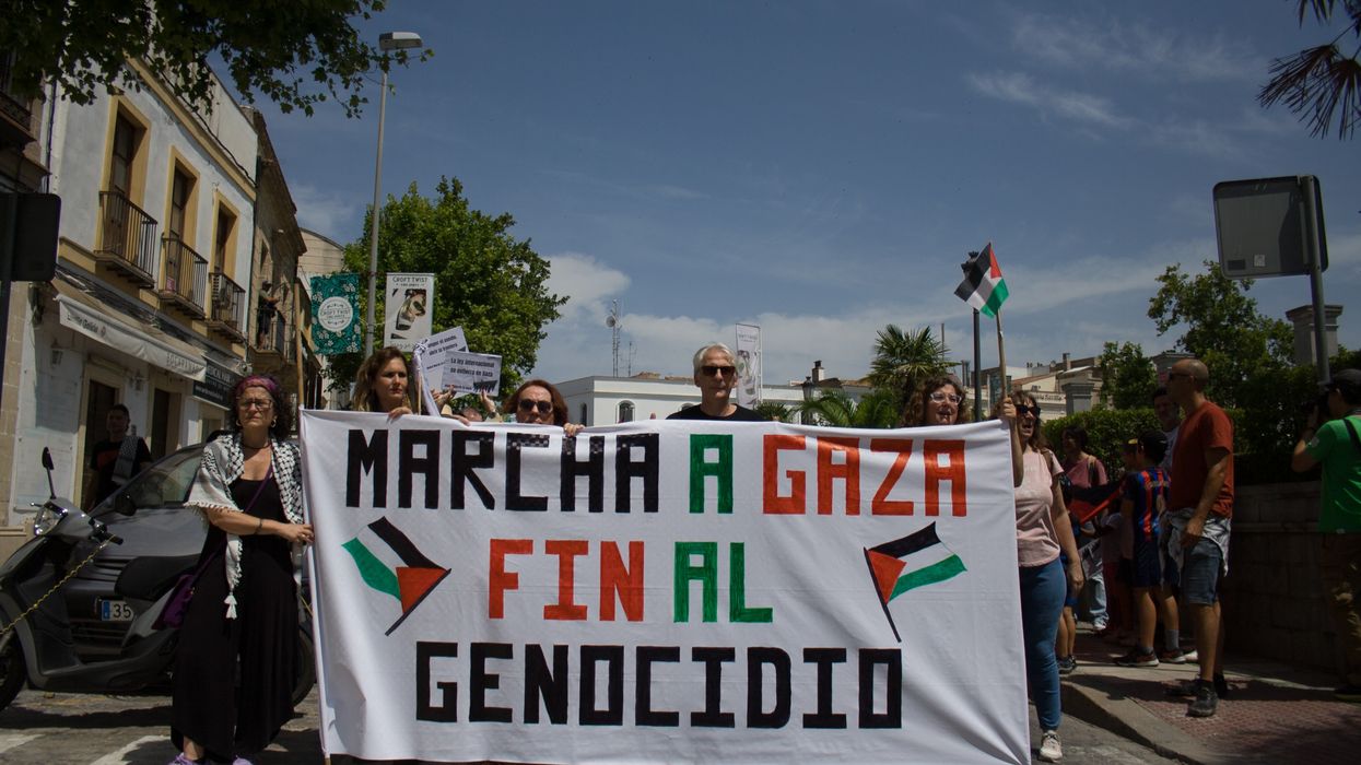 People hold a banner reading, "Martha a Gaza. Fin al genocidio."