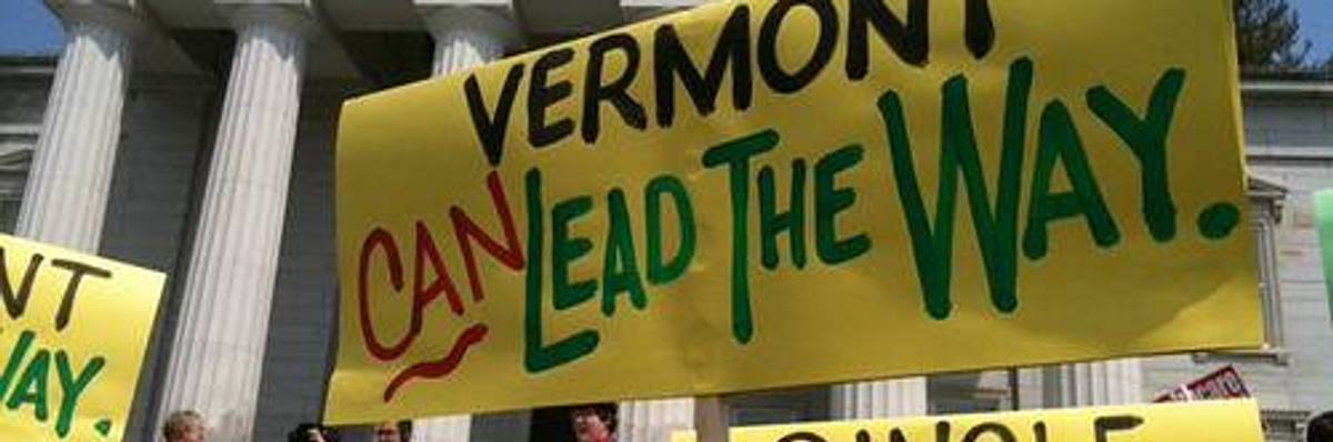 People holding posters in front of a government building
