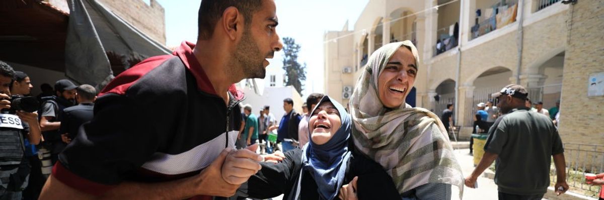 People in Gaza mourning the loss of their loved ones after Israeli attack
