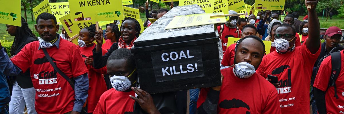 People in Kenya protest coal plant.