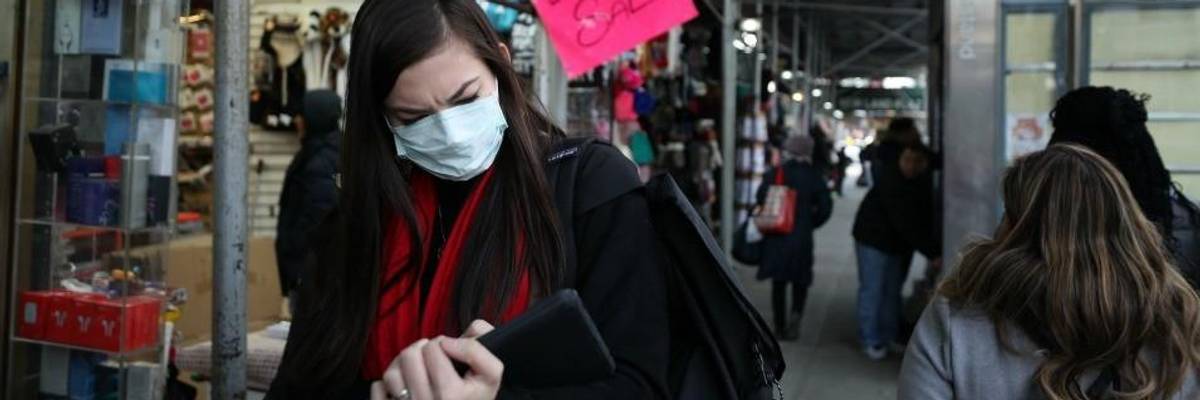 People in New York wear masks to protect against the coronavirus