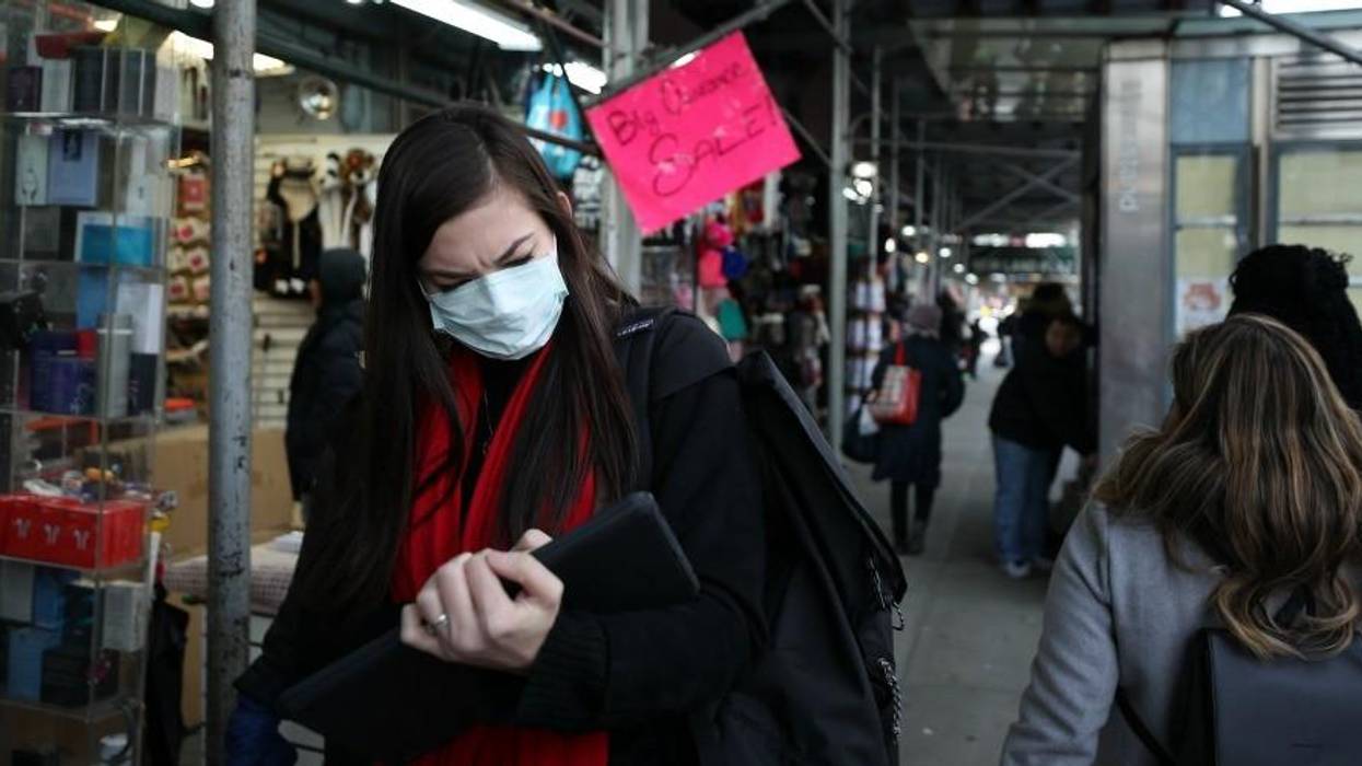 People in New York wear masks to protect against the coronavirus
