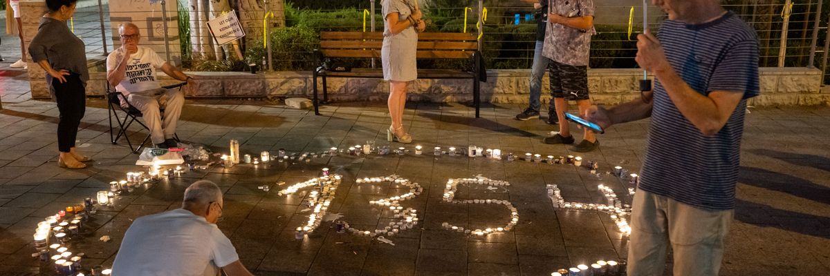 People light candles