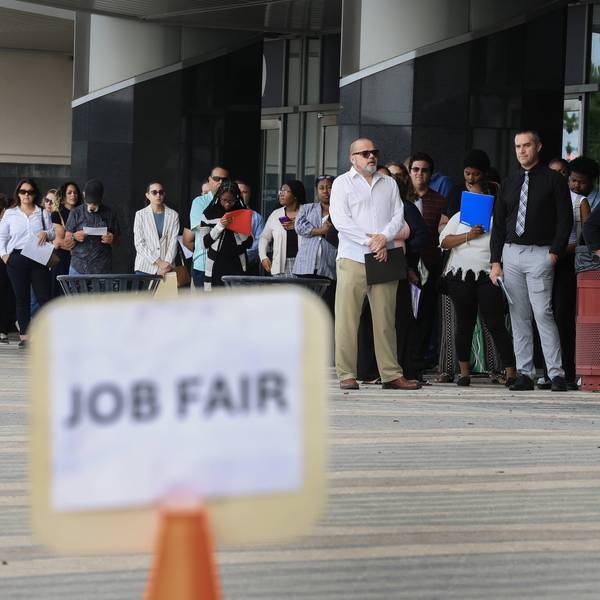 People line up at a job fair
