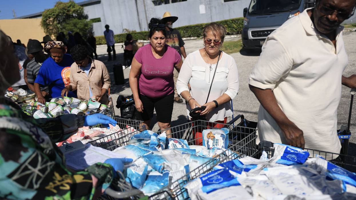 People line up for food donations