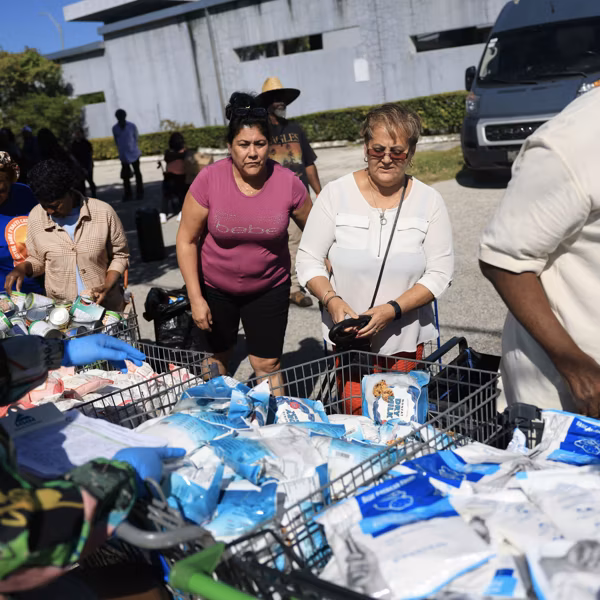 People line up for food donations