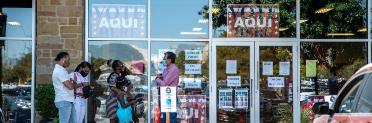 People line up to vote in Texas.