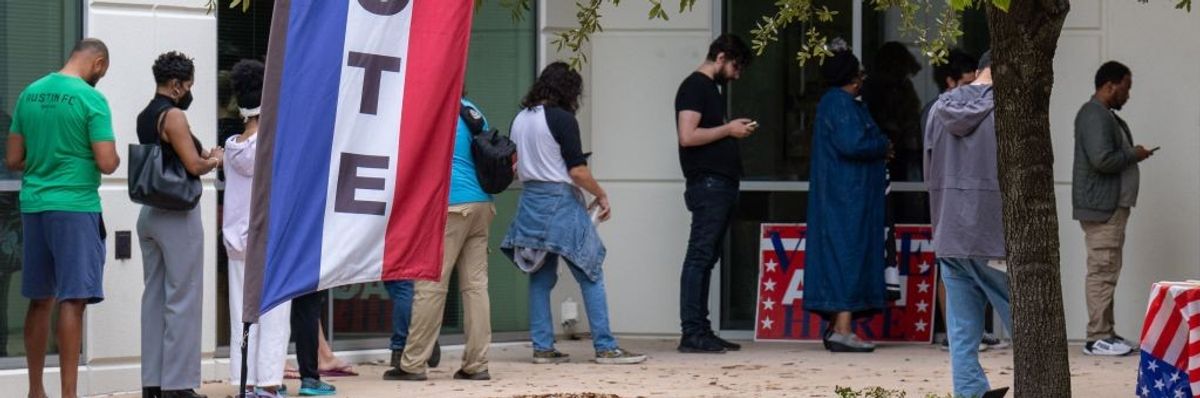 People line up to vote in Texas.